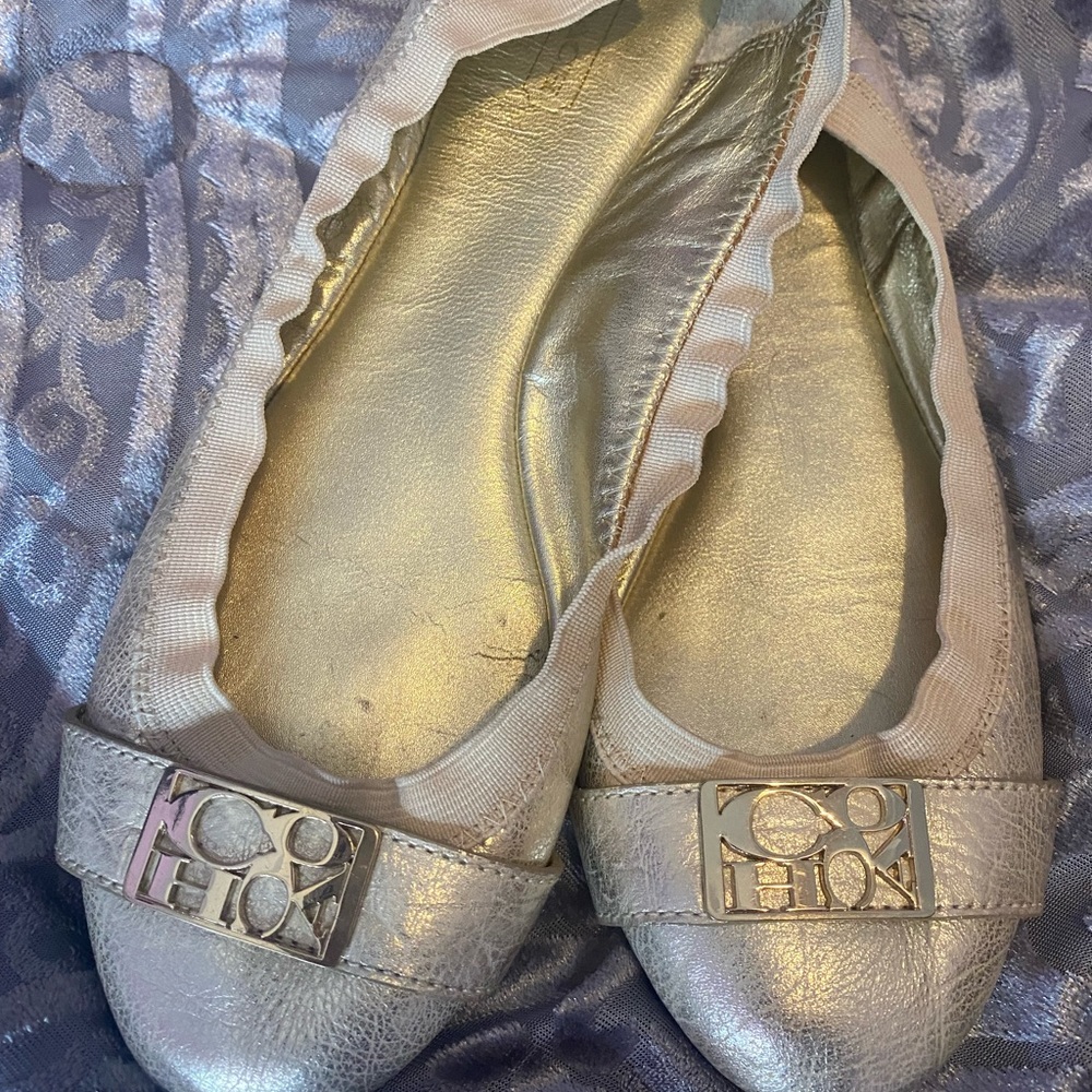 Gold and cream coach flats